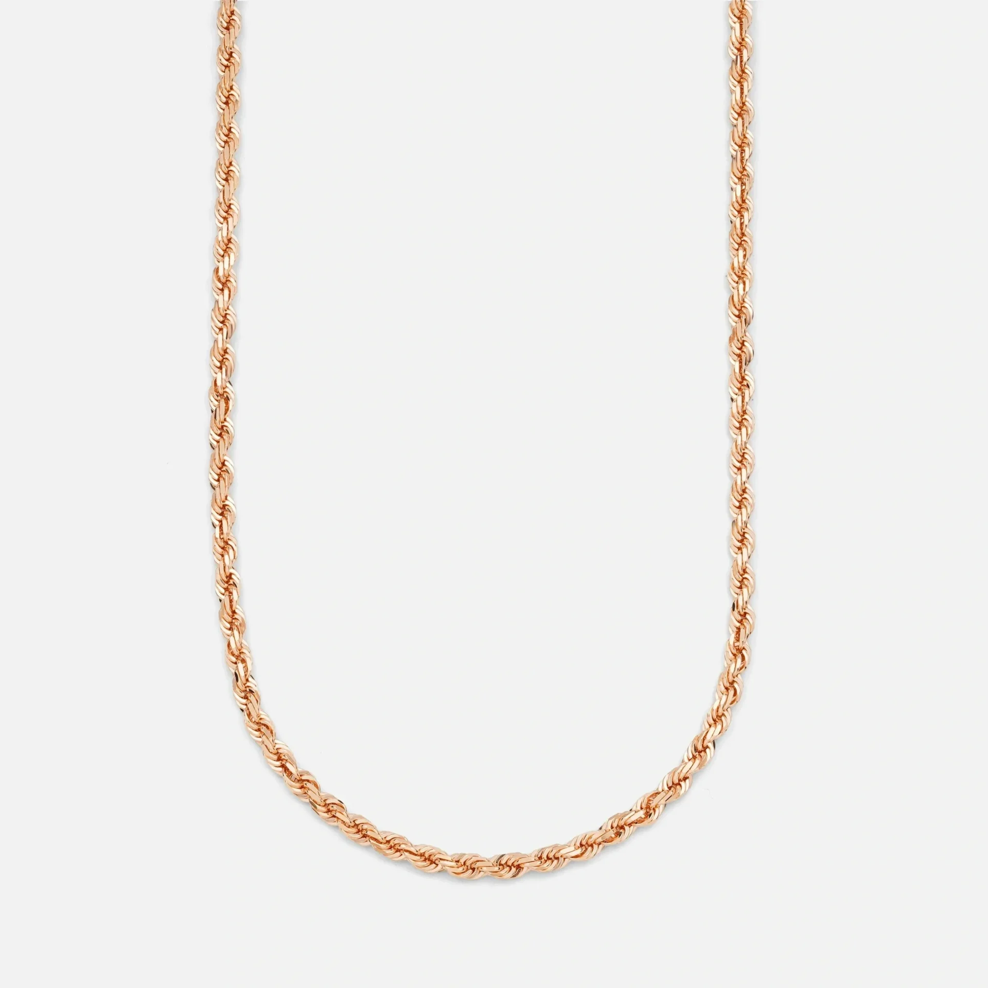 A gold chain necklace is shown on a white background.